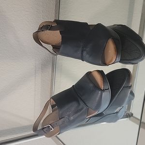 Naya brand platforms, black leather, size 8.5